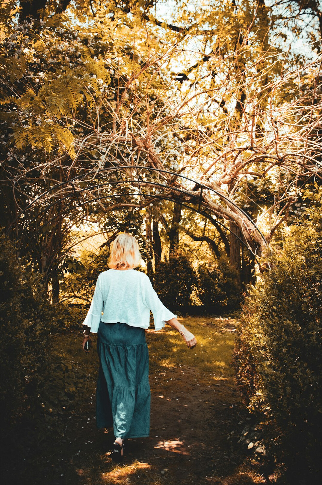 elderly person relaxing in garden